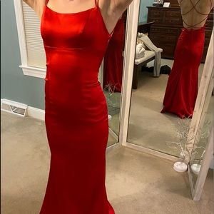 Red Sherri Hill prom dress.  Size 2.  Never worn.  Matching mask.